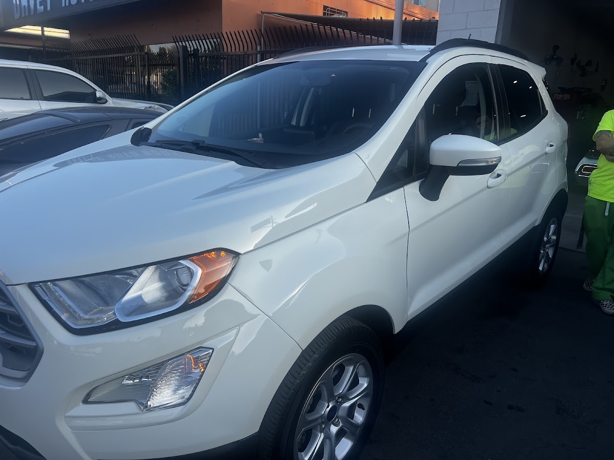 White Ford EcoSport outside the Davey Auto Body shop