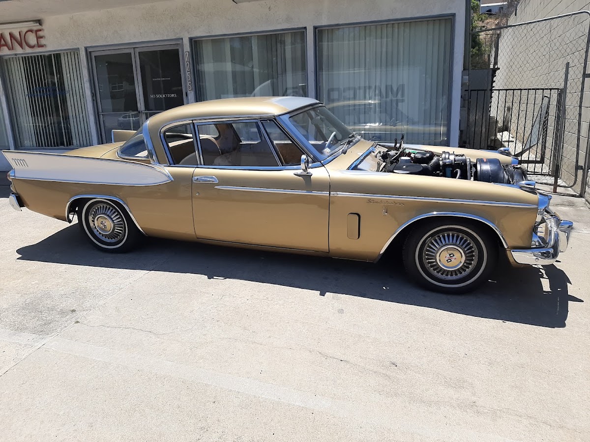 Gold-and-white Studebaker at the Davey Auto Body shop